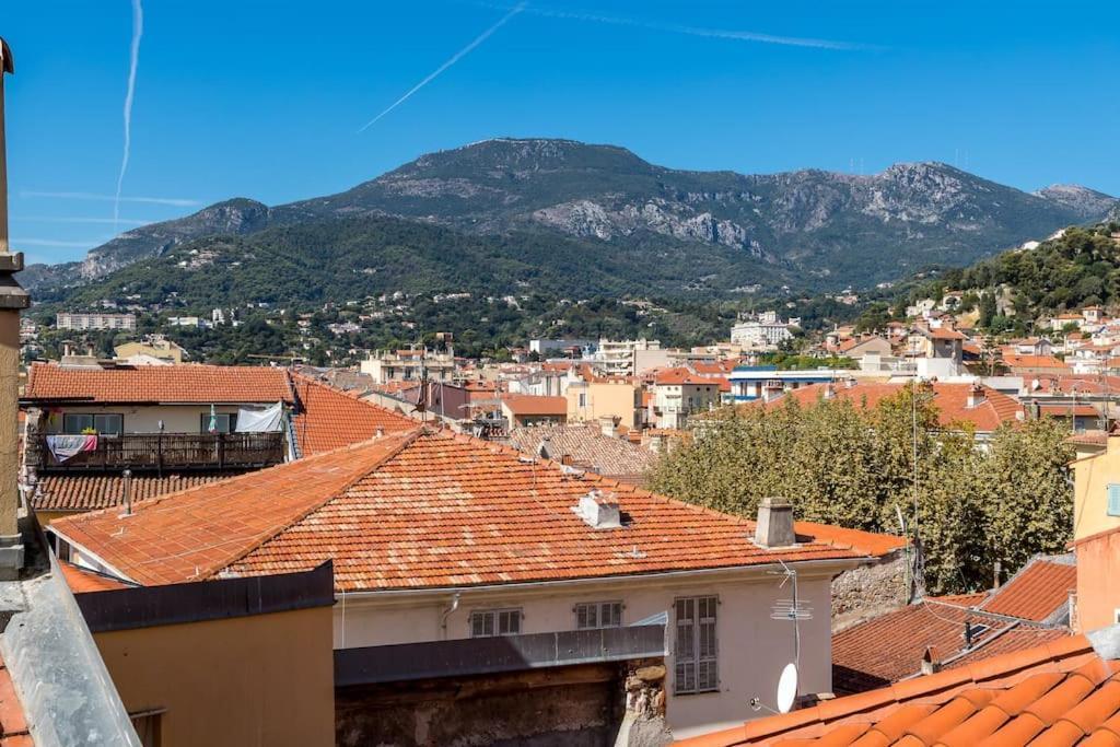 Between The Roofs Of Menton Old Town And The Sea Экстерьер фото